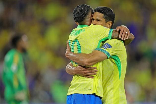 4th September 2025: Rio de Janeiro, Brazil: Raphinha and Douglas Santos of Brazil celebrates the first goal for his team scored by Estevao Willian during the match between Brazil and Chile for the 17st round of the FIFA 2026 qualifiers, at Maracana Stadium, in Rio de Janeiro, Brazil  HeulerxAndrey