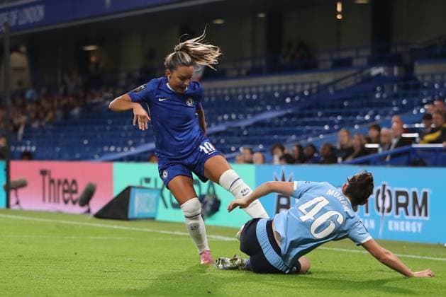 5th September 2025; Stamford Bridge, London, England: Womens Super League Football, Chelsea versus Manchester City Women; Johanna Rytting Kaneryd of Chelsea wins the challenge with Lily Murphy of Manchester City who then landed on her arm awkwardly requiring medical treatment and is stretchered off  KatiexChan