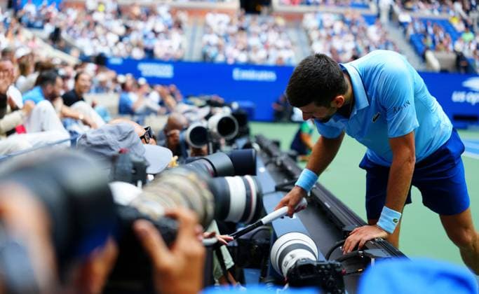Novak Djokovic playfully pokes his racquet at courtside phoographers 2025 US Open, Day Thirteen, USTA Billie Jean King National Tennis Center, New York, USA - 05 Sept 2025New York USTA Billie Jean King National T New York (NY) United States of America  Copyright: xJavierxGarcia Shutterstockx 15467793u