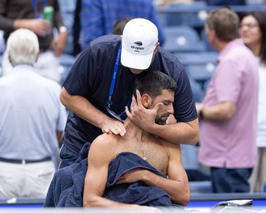 Novak Djokovic SRB being treated, treatment, injury, injured, US Open Championships 2023, USTA Billie Jean King National Tennis Center, Flushing Meadows, New York, USA Copyright: xJuergenxHasenkopfx