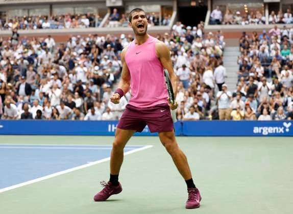 Carlos Alcaraz of Spain celebrates after defeating Novak Djokovic of Serbia in a Men s semifinal match at the 2025 US Open Tennis Championship at the USTA Billie Jean King National Tennis Center in New York City on Friday, September 5, 2025. Alcaraz won 6-4, 7-6, 6-2 and advances to the finals on Sunday.  NYP20250905925 JOHNxANGELILLO