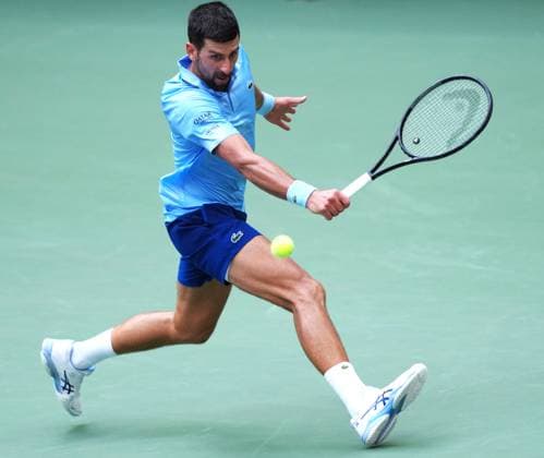 (250906) -- NEW YORK, Sept. 6, 2025 -- Novak Djokovic of Serbia hits a return during the men s singles semifinal match against Carlos Alcaraz of Spain at the 2025 US Open tennis championships in New York, the United States, Sept. 5, 2025. ) (SP)U.S.-NEW YORK-TENNIS-US OPEN-MEN S SINGLES-SEMIFINALS WuxXiaoling 