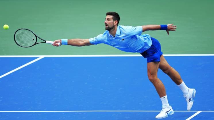 (250906) -- NEW YORK, Sept. 6, 2025 -- Novak Djokovic of Serbia hits a return during the men s singles semifinal match against Carlos Alcaraz of Spain at the 2025 US Open tennis championships in New York, the United States, Sept. 5, 2025. ) (SP)U.S.-NEW YORK-TENNIS-US OPEN-MEN S SINGLES-SEMIFINALS WuxXiaoling 