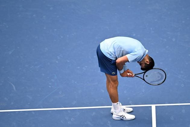 (250906) -- NEW YORK, Sept. 6, 2025 -- Novak Djokovic reacts during the men s singles semifinal match between Novak Djokovic of Serbia and Carlos Alcaraz of Spain at the 2025 US Open tennis championships in New York, the United States, Sept. 5, 2025. ) (SP)U.S.-NEW YORK-TENNIS-US OPEN-MEN S SINGLES-SEMIFINALS LixRui 