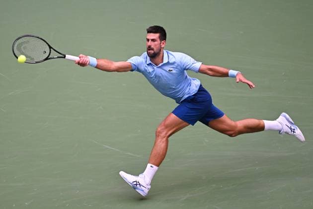 (250906) -- NEW YORK, Sept. 6, 2025 -- Novak Djokovic hits a return during the men s singles semifinal match between Novak Djokovic of Serbia and Carlos Alcaraz of Spain at the 2025 US Open tennis championships in New York, the United States, Sept. 5, 2025. ) (SP)U.S.-NEW YORK-TENNIS-US OPEN-MEN S SINGLES-SEMIFINALS LixRui 