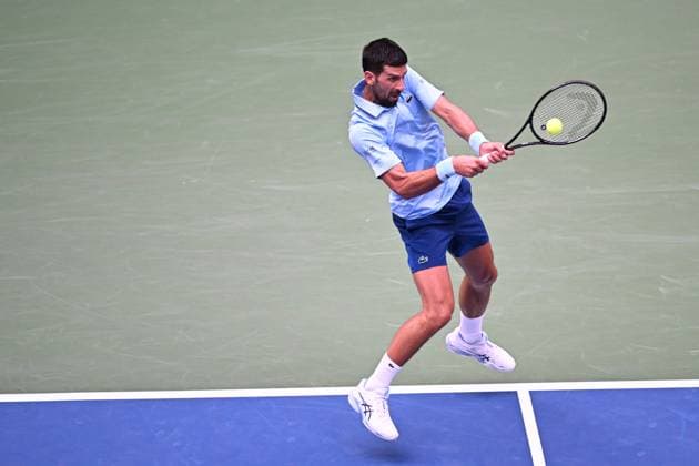(250906) -- NEW YORK, Sept. 6, 2025 -- Novak Djokovic hits a return during the men s singles semifinal match between Novak Djokovic of Serbia and Carlos Alcaraz of Spain at the 2025 US Open tennis championships in New York, the United States, Sept. 5, 2025. ) (SP)U.S.-NEW YORK-TENNIS-US OPEN-MEN S SINGLES-SEMIFINALS LixRui 