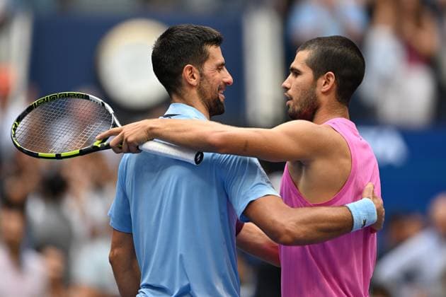 (250906) -- NEW YORK, Sept. 6, 2025 -- Novak Djokovic greets Carlos Alcaraz (R) after the men s singles semifinal match between Novak Djokovic of Serbia and Carlos Alcaraz of Spain at the 2025 US Open tennis championships in New York, the United States, Sept. 5, 2025. ) (SP)U.S.-NEW YORK-TENNIS-US OPEN-MEN S SINGLES-SEMIFINALS LixRui 