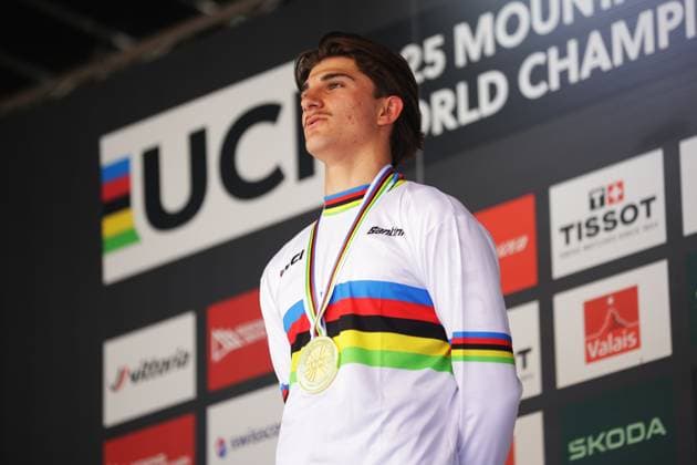 2025 UCI Mountain Bike World Championships Picture by Ed Sykes SWpix.com - 06 09 2025 - Cycling - 2025 UCI Mountain Bike World Championships - Downhill - ChampÃ ry, Valais, Switzerland - Men Junior Final - Podium - Max Alran (France) receiving the Gold Medal to become World Champion Copyright: x xSWpix.comx(t axPhotographyxHubxLtd)xEdxSykes SWpix.comx SWP-3030-2241