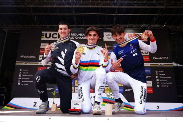 2025 UCI Mountain Bike World Championships Picture by Ed Sykes SWpix.com - 06 09 2025 - Cycling - 2025 UCI Mountain Bike World Championships - Downhill - ChampÃ ry, Valais, Switzerland - Men Junior Final - Podium - Max Alran (France) receiving the Gold Medal to become World Champion with Tyler Waite (New Zealand) receiving the Silver Medal and Till Alran (France) receiving the Bronze Medal Copyright: x xSWpix.comx(t axPhotographyxHubxLtd)xEdxSykes SWpix.comx SWP-3030-2242