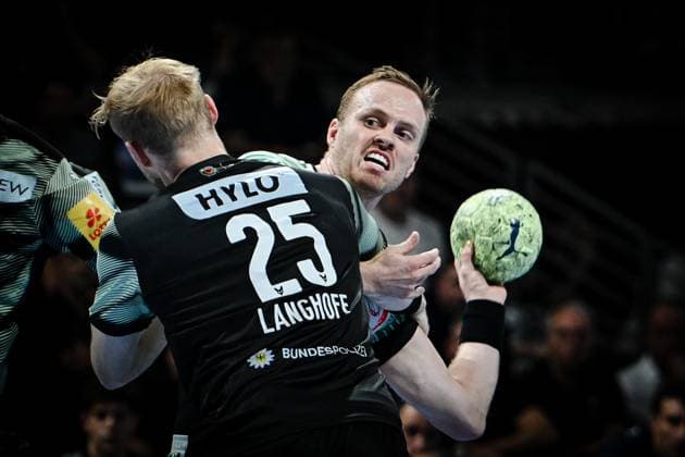 06 09 2025, xlakx, Handball Daikin HBL, Fuechse Berlin SC Magdeburg v l Matthes Langhoff Fuechse Berlin , Omar Ingi Magnusson SC Magdeburg , duel, fight, tackle Berlin Daniel Lakomski