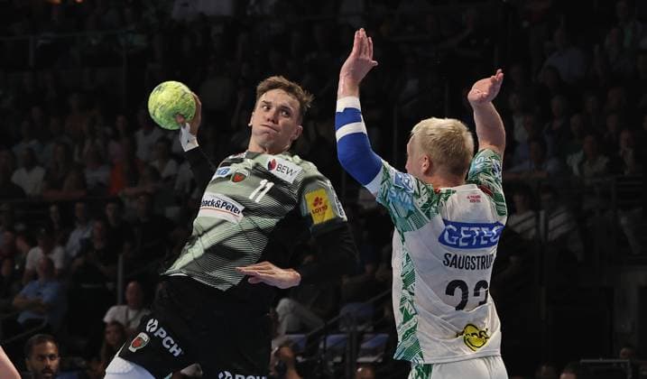Lasse Andersson, Magnus Saugstrup duel Match scene Action Sport Handball HBL Bundesliga Men 3 Matchday Season 2025 2026 06 09 2025 Füchse Berlin vs SC Magdeburg SCM