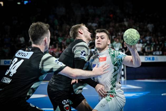 06 09 2025, xlakx, Handball Daikin HBL, Fuechse Berlin SC Magdeburg v l Mathias Gidsel Fuechse Berlin , Elvar Oern Jonsson SC Magdeburg , duel, fight, tackle Berlin Daniel Lakomski