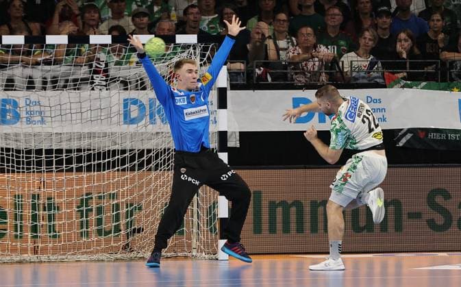Goalkeeper Lasse Ludwig stops Lukas Mertens duel Game scene Action Sport Handball HBL Bundesliga Men 3 Matchday Season 2025 2026 06 09 2025 Füchse Berlin vs SC Magdeburg SCM