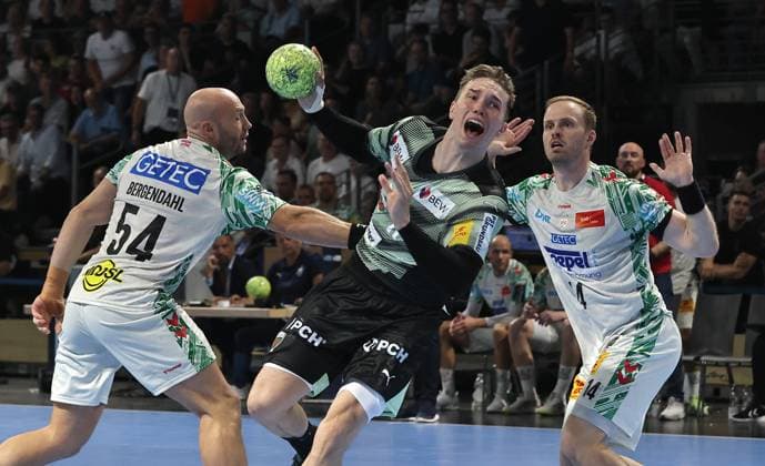 Oscar Bergendahl, Lasse Andersson on the ball, Omar Ingi Magnusson duel Game scene Action Sport Handball HBL Bundesliga Men 3 Matchday Season 2025 2026 06 09 2025 Füchse Berlin vs SC Magdeburg SCM