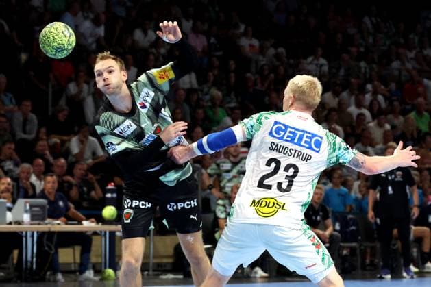 DEU, DHB, 1 HBL, Fuechse Berlin vs SC Magdeburg, 06 09 2025, Max Schmeling Halle, Berlin, DEU, DHB, 1 HBL, Fuechse Berlin vs SC Magdeburg, in the picture Mathias Gidsel Fuechse Berlin 19 , Magnus Saugstrup SC Magdeburg 23 nordphotoxGmbHx xEngler nph00076