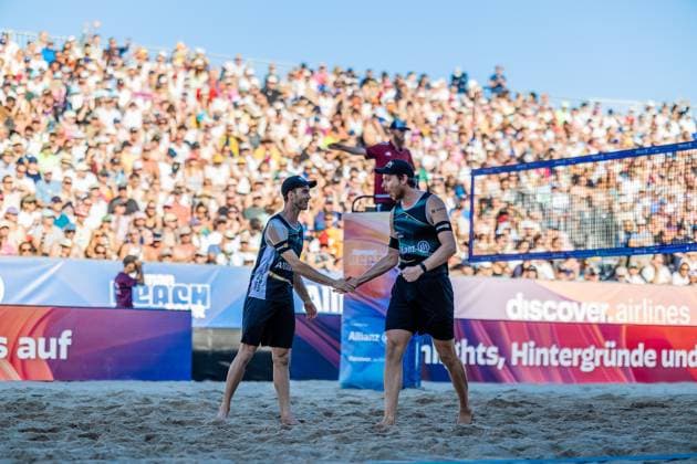 Beach volleyball I German Championships 2025 I Timmendorfer Strand I Day 3 I 06 09 2025 Clemens Wickler ETV Hamburg and Nils Ehlers ETV Hamburg high-five each other Timmendorfer Strand Schleswig Holstein Germany Copyright: xLobeca JasperxLorenzx
