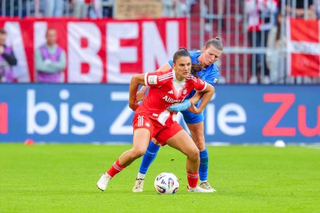 Jovana Damnjanovic 9, FC Bayern Munich and Claudia Wenger 5, Bayer 04 Leverkusen at the match between FC Bayern Munich v Bayer 04 Leverkusen, Football, Women, Google Pixel Women Bundesliga, 2025 2026, 1 Matchday on 06 09 2025 in Munich, Allianz Arena DFL and DFB regulations prohibit any use of photographs as image sequences and or quasi video Bayern Germany