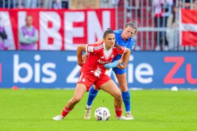 Jovana Damnjanovic 9, FC Bayern Munich and Claudia Wenger 5, Bayer 04 Leverkusen at the match between FC Bayern Munich v Bayer 04 Leverkusen, Football, Women, Google Pixel Women Bundesliga, 2025 2026, 1 Matchday on 06 09 2025 in Munich, Allianz Arena DFL and DFB regulations prohibit any use of photographs as image sequences and or quasi video Bayern Germany