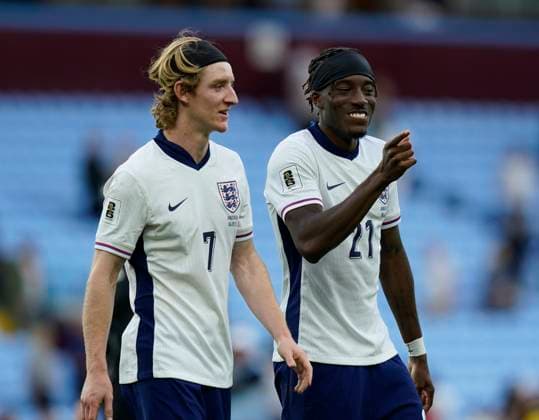 Birmingham, England, 6th September 2025. Anthony Gordon of England and Noni Madueke of England enjoy the match during the England vs Andorra FIFA World Cup, WM, Weltmeisterschaft, Fussball Qualifier match at Villa Park, Birmingham. Picture credit should read: Andrew Yates Sportimage EDITORIAL USE ONLY. No use with unauthorised audio, video, data, fixture lists, club league logos or live services. Online in-match use limited to 120 images, no video emulation. No use in betting, games or single club league player publications. SPI_116_AY_ENG_AND SPI-4113-0111
