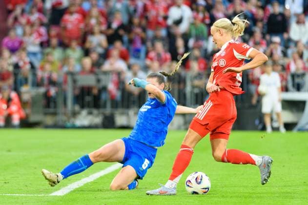 Munich, Germany, September 6th 2025: Pernille Harder (21 FC Bayern Munich) to sidestep Claudia Wenger (5 Bayer Leverkusen) during the Google Pixel Frauen Bundesliga match between FC Bayern Munich and Bayer Leverkusen at Allianz Arena, Munich, Germany. (Sven Beyrich SPP) Copyright: xSvenxBeyrich SPPx spp-en-SvBe-SvBe-20250906-D4S_8189