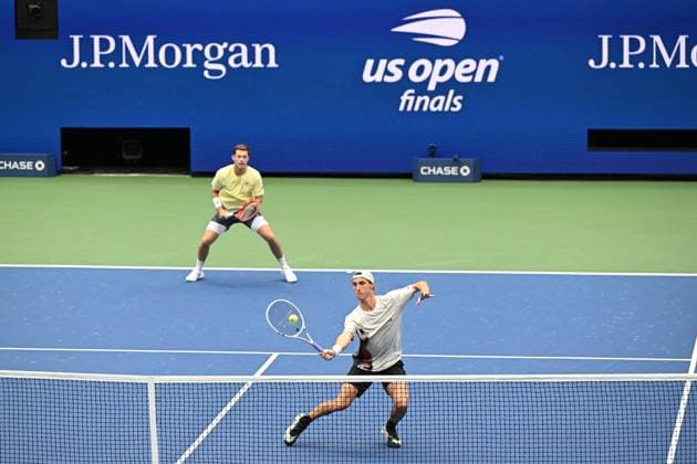 (250907) -- NEW YORK, Sept. 7, 2025 -- Joe Salisbury (R) Neal Skupski return a hit during the men s doubles final match between Marcel Granollers of Spain Horacio Zeballos of Argentina and Joe Salisbury Neal Skupski of Britain at the 2025 US Open tennis championships in New York, the United States, Sept. 6, 2025. ) (SP)U.S.-NEW YORK-TENNIS-US OPEN-MEN S DOUBLES-FINAL LixRui 