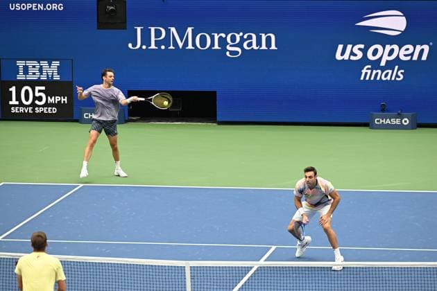 (250907) -- NEW YORK, Sept. 7, 2025 -- Marcel Granollers Horacio Zeballos (back) return a hit during the men s doubles final match between Marcel Granollers of Spain Horacio Zeballos of Argentina and Joe Salisbury Neal Skupski of Britain at the 2025 US Open tennis championships in New York, the United States, Sept. 6, 2025. ) (SP)U.S.-NEW YORK-TENNIS-US OPEN-MEN S DOUBLES-FINAL LixRui 