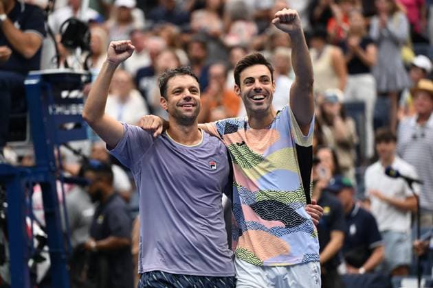 (250907) -- NEW YORK, Sept. 7, 2025 -- Marcel Granollers (R) Horacio Zeballos celebrate after winning the men s doubles final match between Marcel Granollers of Spain Horacio Zeballos of Argentina and Joe Salisbury Neal Skupski of Britain at the 2025 US Open tennis championships in New York, the United States, Sept. 6, 2025. ) (SP)U.S.-NEW YORK-TENNIS-US OPEN-MEN S DOUBLES-FINAL LixRui 