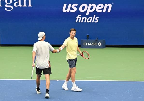 (250907) -- NEW YORK, Sept. 7, 2025 -- Joe Salisbury (L) Neal Skupski celebrate scoring during the men s doubles final match between Marcel Granollers of Spain Horacio Zeballos of Argentina and Joe Salisbury Neal Skupski of Britain at the 2025 US Open tennis championships in New York, the United States, Sept. 6, 2025. ) (SP)U.S.-NEW YORK-TENNIS-US OPEN-MEN S DOUBLES-FINAL LixRui 