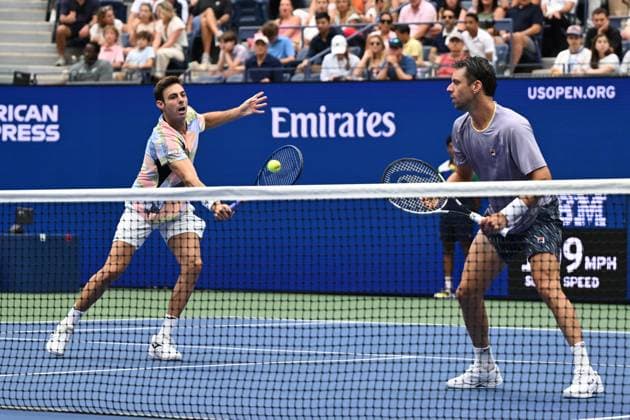 (250907) -- NEW YORK, Sept. 7, 2025 -- Marcel Granollers (L) Horacio Zeballos return a hit during the men s doubles final match between Marcel Granollers of Spain Horacio Zeballos of Argentina and Joe Salisbury Neal Skupski of Britain at the 2025 US Open tennis championships in New York, the United States, Sept. 6, 2025. ) (SP)U.S.-NEW YORK-TENNIS-US OPEN-MEN S DOUBLES-FINAL LixRui 