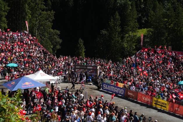 2025 UCI Mountain Bike World Championships Picture by Thomas Maheux SWpix.com - 07 09 2025 - Cycling - 2025 UCI Mountain Bike World Championships - Downhill - ChampÃ ry, Valais, Switzerland - Women Elite Final - A general view (GV) of the finish area, Lisa Baumann (Switzerland) Copyright: x xSWpix.comx(t axPhotographyxHubxLtd)xThomasxMaheux SWpix.comx SWP-3030-2515