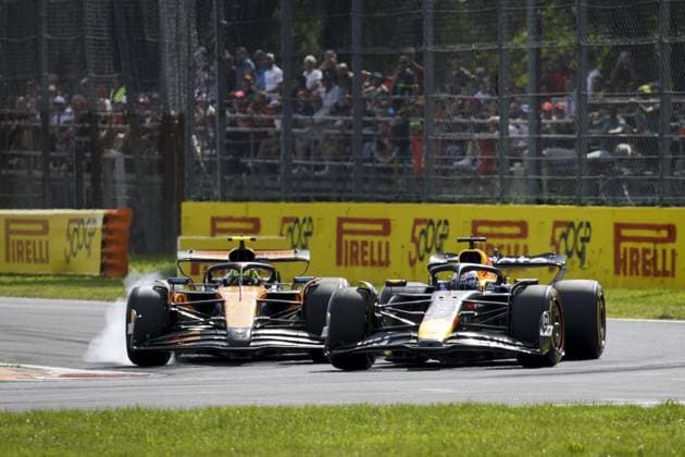 MONZA - Max Verstappen (Red Bull Racing) passes Lando Norris (McLaren) at the Monza circuit during the Italian Grand Prix. ANP SEM VAN DER WAL xVIxANPxSportx xxANPxIVx 535276994 originalFilename: 535276994.jpg