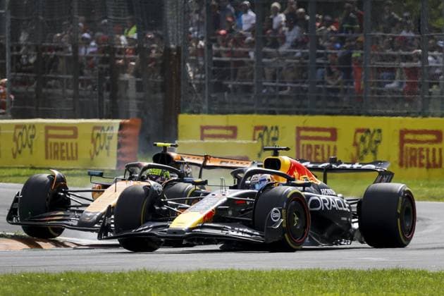 MONZA - Max Verstappen (Red Bull Racing) passes Lando Norris (McLaren) at the Monza circuit during the Italian Grand Prix. ANP SEM VAN DER WAL xVIxANPxSportx xxANPxIVx 535277307 originalFilename: 535277307.jpg