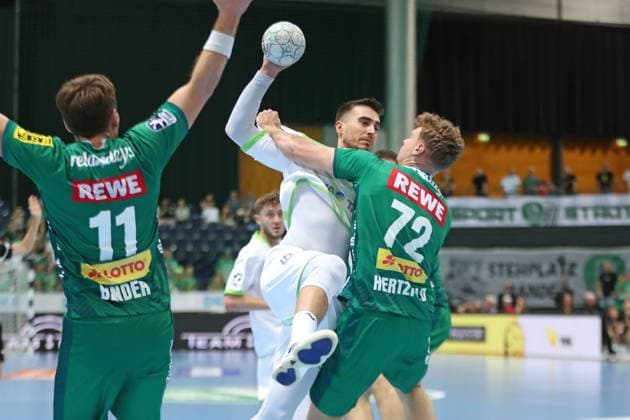 DAIKIN HBL SC DHfK Leipzig vs HSG Wetzlar, 07 09 25 Filip Vistorop 4, HSG Wetzlar is stopped by Tim Hertzfeld 72, SC DHfK Leipzig Handball, DAIKIN HBL, 1 Bundesliga, Season 2025 2026, Matchday 3 SC DHfK Leipzig vs HSG Wetzlar on 07 09 25 at Quarterback Immobilien Arena Leipzig Copyright: xBEAUTIFULxSPORTS JanxKaeferx