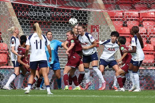 7th September 2025; Brisbane Road, London, England; Womens Super League Football, Tottenham Hotspur versus West Ham United; Goal mouth scrambles from a West Ham United corner kick with Clare Hunt of Tottenham Hotspur heading the ball away  KatiexChan