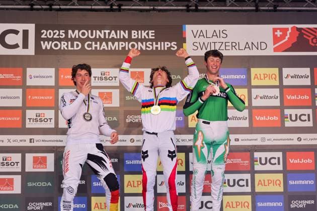 2025 UCI Mountain Bike World Championships Picture by Alex Whitehead SWpix.com - 07 09 2025 - Cycling - 2025 UCI Mountain Bike World Championships - Downhill - ChampÃ ry, Valais, Switzerland - Men Elite Podium - Jackson Goldstone (Canada) receiving the Gold Medal to become World Champion with Henri Kiefer (Germany) receiving the Silver Medal and Ronan Dunne (Ireland) receiving the Bronze Medal Copyright: x xSWpix.comx(t axPhotographyxHubxLtd)xAlexxWhitehead SWpix.comx SWP-3030-2818