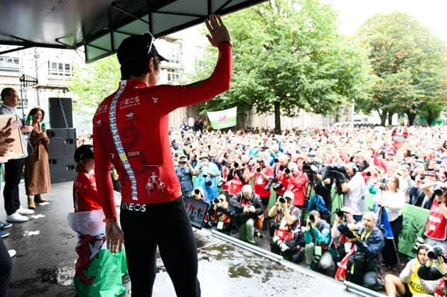 2025 Lloyds Tour of Britain Picture by Simon Wilkinson SWpix.com - 07 09 2025 - Cycling - 2025 Lloyds Tour of Britain - Stage 6: Newport to Cardiff - Geraint Thomas (INEOS Grenadiers) and his son Macs onto the podium to commemorate his career in cycling Copyright: x xSWpix.comx(t axPhotographyxHubxLtd)xSimonxWilkinson SWpix.comx SWP-3069-2657