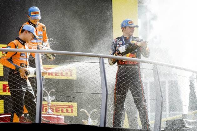 MONZA - Max Verstappen (Red Bull Racing) on the podium at the Monza circuit with Lando Norris (McLaren) and Oscar Piastri (McLaren) after winning the Italian Grand Prix. ANP SEM VAN DER WAL xVIxANPxSportx xxANPxIVx 535283365 originalFilename: 535283365.jpg