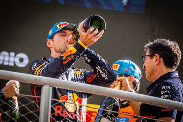 F1 ITALIAN GRAND PRIX SUNDAY Max Verstappen of the Netherlands and Oracle Red Bull Racing celebrates on podium with a champagne during the sunday s race of the F1 Grand Prix of Italy - Formula 1 Pirelli Gran Premio D Italia 2025 at Autodromo Nazionale Monza Circuit on September 07, 2025, in Monza, Italy. Copyright: xx 080A2480
