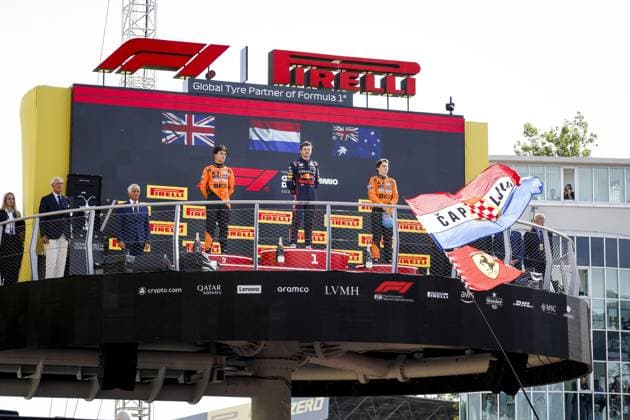 MONZA - Max Verstappen (Red Bull Racing), Lando Norris (McLaren), and Oscar Piastri (McLaren) on the podium at the Monza circuit after winning the Italian Grand Prix. ANP SEM VAN DER WAL xVIxANPxSportx xxANPxIVx 535284644 originalFilename: 535284644.jpg