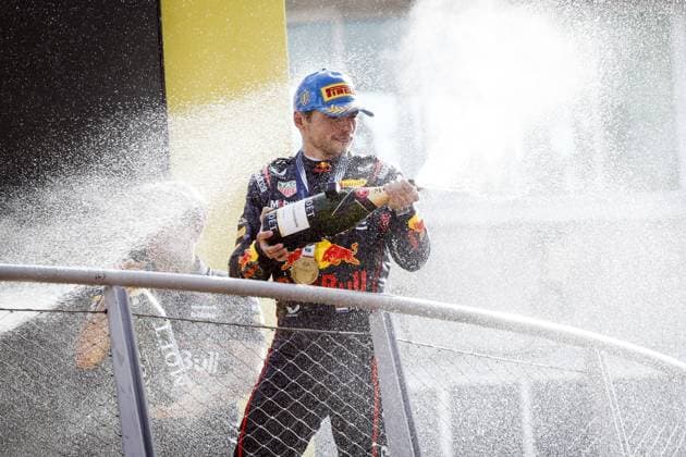 MONZA - Max Verstappen (Red Bull Racing) on the podium at the Monza circuit after winning the Italian Grand Prix. ANP SEM VAN DER WAL xVIxANPxSportx xxANPxIVx 535285619 originalFilename: 535285619.jpg