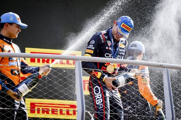 MONZA - Max Verstappen (Red Bull Racing) on the podium at the Monza circuit with Lando Norris (McLaren) and Oscar Piastri (McLaren) after winning the Italian Grand Prix. ANP SEM VAN DER WAL xVIxANPxSportx xxANPxIVx 535285770 originalFilename: 535285770.jpg