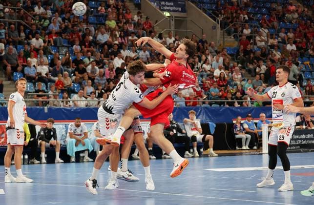 07 09 2025, Germany, Bietigheim, Handball 2 Bundesliga, SG BBM Bietigheim vs VfL Lübeck Schwartau, f l Rasmus Willette Houmöller VfL , Finn Luca Nicolaus BBM