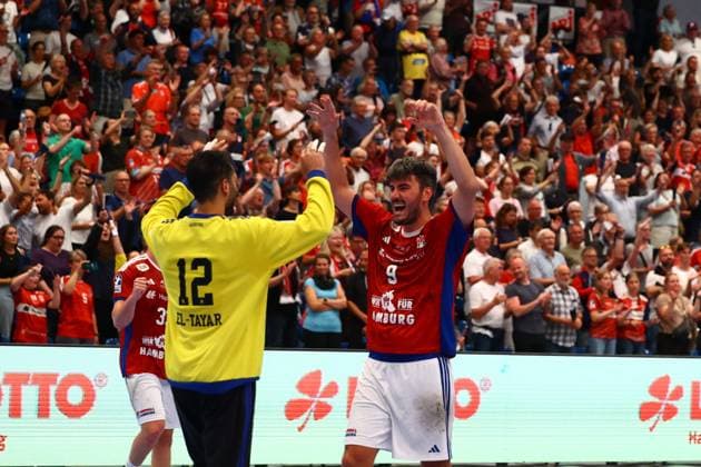 Handball I Men I Season 2025 2026 I Bundesliga I Matchday 3 I HSV Hamburg Rhein Neckar Löwen I 07 09 2025 Mohamed Essam Moustafa El Tayar 12, HSV Hamburg Jacob Lassen 9, HSV Hamburg celebrate home win Hamburg Alsterdorfer Sporthalle Hamburg Germany Copyright: xLobeca RalfxHomburgx