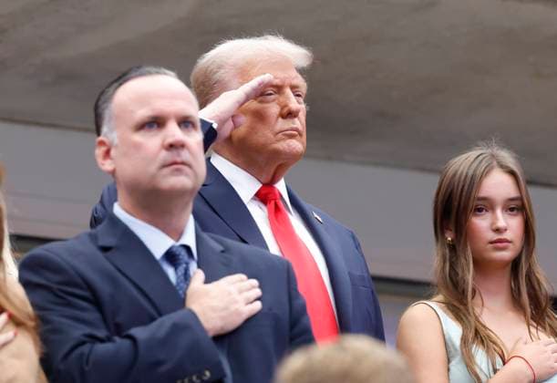 President Donald Trump and his granddaughter Arabella Kushner (R) stand uring the playing of the National Anthem before Jannik Sinner of Italy plays Carlos Alcaraz of Spain in the Men s Finals of the 2025 US Open Tennis Championship in Arthur Ashe Stadium at the USTA Billie Jean King National Tennis Center in Flushing Meadows, New York, on Sunday, September 7, 2025.  NYP20250907118 COREYxSIPKIN