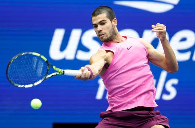 Carlos Alcaraz of Spain hits a return to Jannik Sinner of Italy in the first set in the Men s Finals of the 2025 US Open Tennis Championship in Arthur Ashe Stadium at the USTA Billie Jean King National Tennis Center in Flushing Meadows, New York, on Sunday, September 7, 2025.  NYP20250907138 COREYxSIPKIN