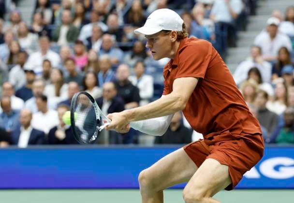 Jannik Sinner of Italy hits a return to Carlos Alcaraz of Spain in the first set in the Men s Finals of the 2025 US Open Tennis Championship in Arthur Ashe Stadium at the USTA Billie Jean King National Tennis Center in Flushing Meadows, New York, on Sunday, September 7, 2025.  NYP20250907145 COREYxSIPKIN