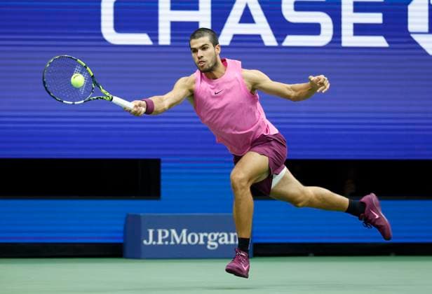 Carlos Alcaraz of Spain hits a return to Jannik Sinner of Italy in the second set in the Men s Finals of the 2025 US Open Tennis Championship in Arthur Ashe Stadium at the USTA Billie Jean King National Tennis Center in Flushing Meadows, New York, on Sunday, September 7, 2025.  NYP20250907148 COREYxSIPKIN