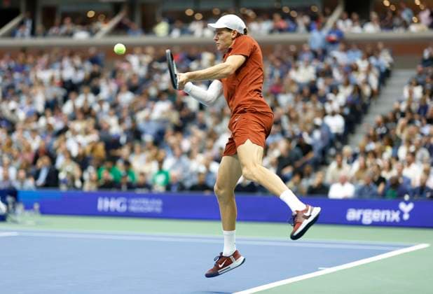 Jannik Sinner of Italy hits a return to Carlos Alcaraz of Spain in the second set in the Men s Finals of the 2025 US Open Tennis Championship in Arthur Ashe Stadium at the USTA Billie Jean King National Tennis Center in Flushing Meadows, New York, on Sunday, September 7, 2025.  NYP20250907151 COREYxSIPKIN