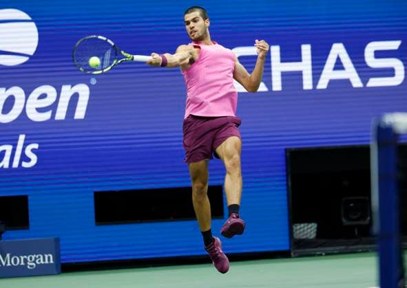 Carlos Alcaraz of Spain hits a return to Jannik Sinner of Italy in the third set in the Men s Finals of the 2025 US Open Tennis Championship in Arthur Ashe Stadium at the USTA Billie Jean King National Tennis Center in Flushing Meadows, New York, on Sunday, September 7, 2025.  NYP20250907167 COREYxSIPKIN