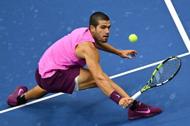(250908) -- NEW YORK, Sept. 8, 2025 -- Carlos Alcaraz of Spain hits a return during the men s singles final match between Carlos Alcaraz of Spain and Jannik Sinner of Italy at the 2025 US Open tennis championships in New York, the United States, Sept. 7, 2025. ) (SP)U.S.-NEW YORK-TENNIS-US OPEN-MEN S SINGLES-FINAL LixRui 